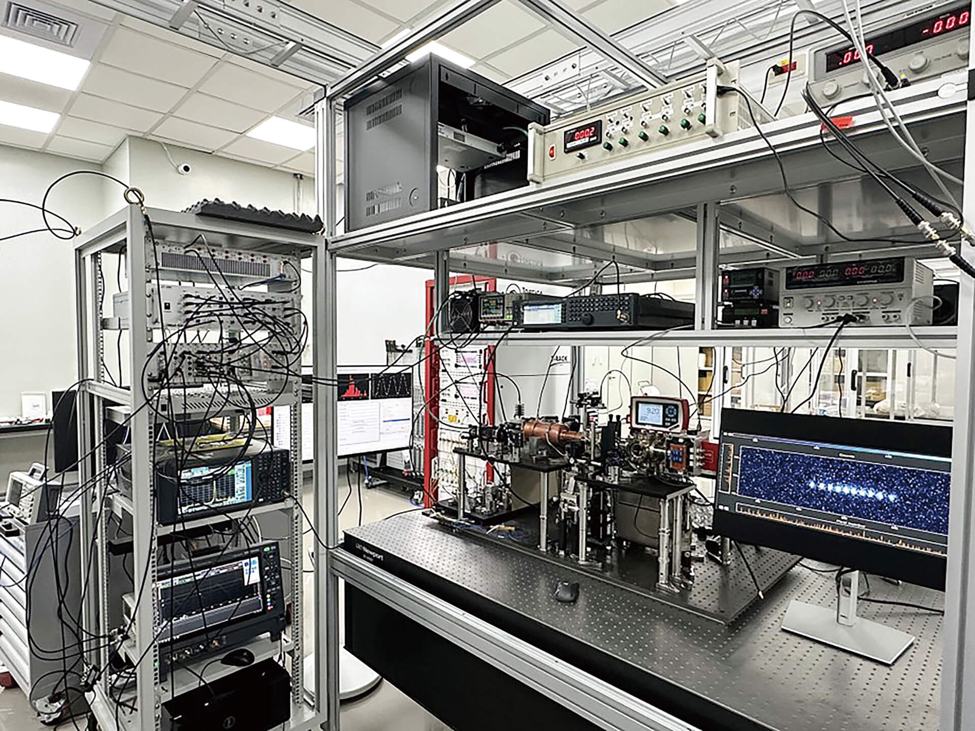 The Trapped-Ion Quantum Computing Laboratory focuses on forward-looking research, exploring how future semiconductor processes can be applied to ion trap systems. Pictured here is the laboratory at the Baogao Smart and Industrial Park in Xindian, New Taipei City.